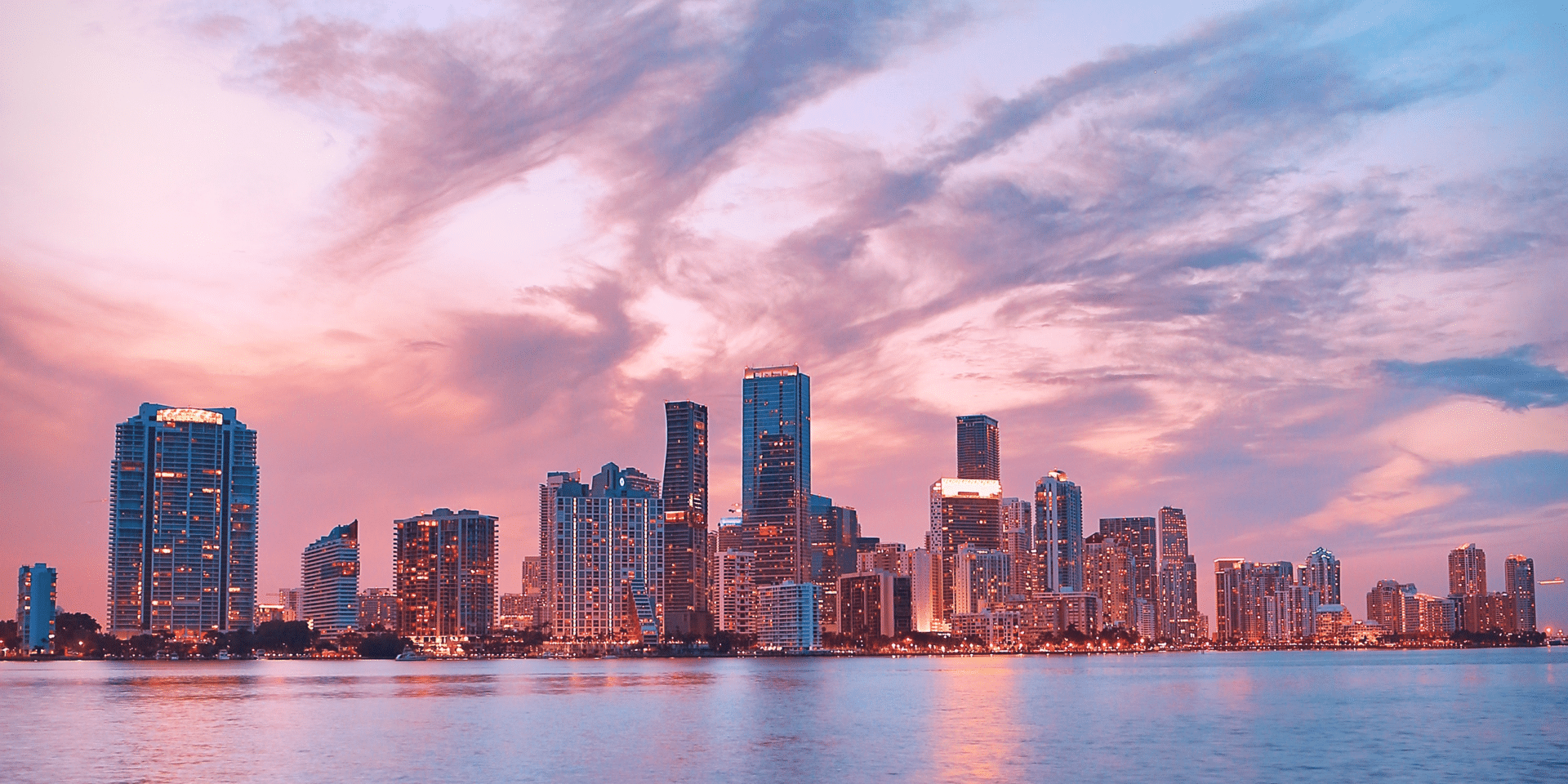 Photo of a sunset skyline and high rise buildings