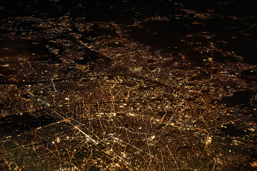 Satellite view of a city lit up at night.